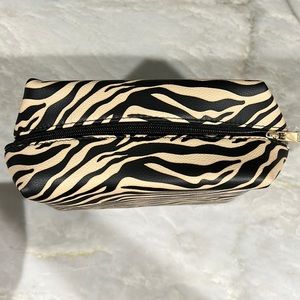 Brand new saks fifth avenue cosmetic bag. Big volume.